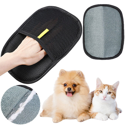 Pet deshedding glove removing loose fur from a dog